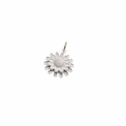 White flower charm with delicate design for versatile accessory use.